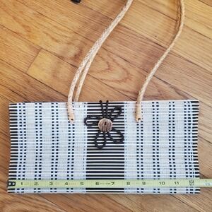 Woven straw rattan purse bag made in‎ Thailand tan brown flower button closure